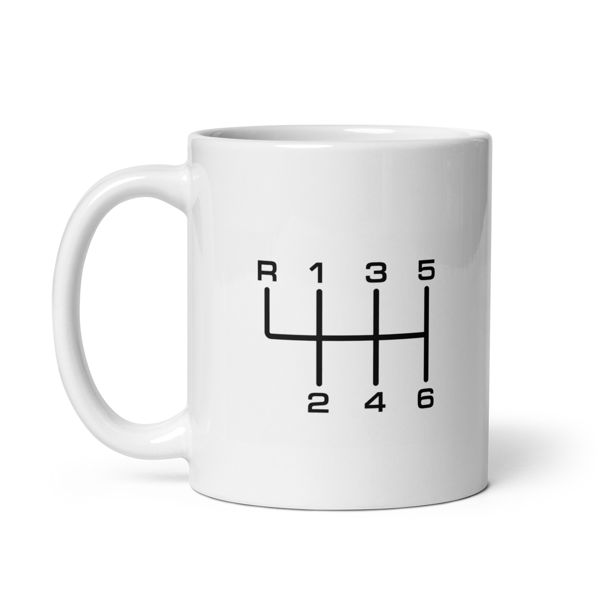 11 oz white ceramic mug with black 6-speed manual transmission shift pattern