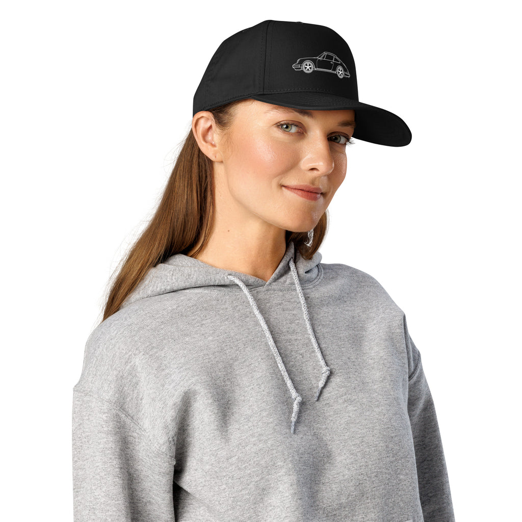 Woman wearing black minimalist 911 car enthusiast hat