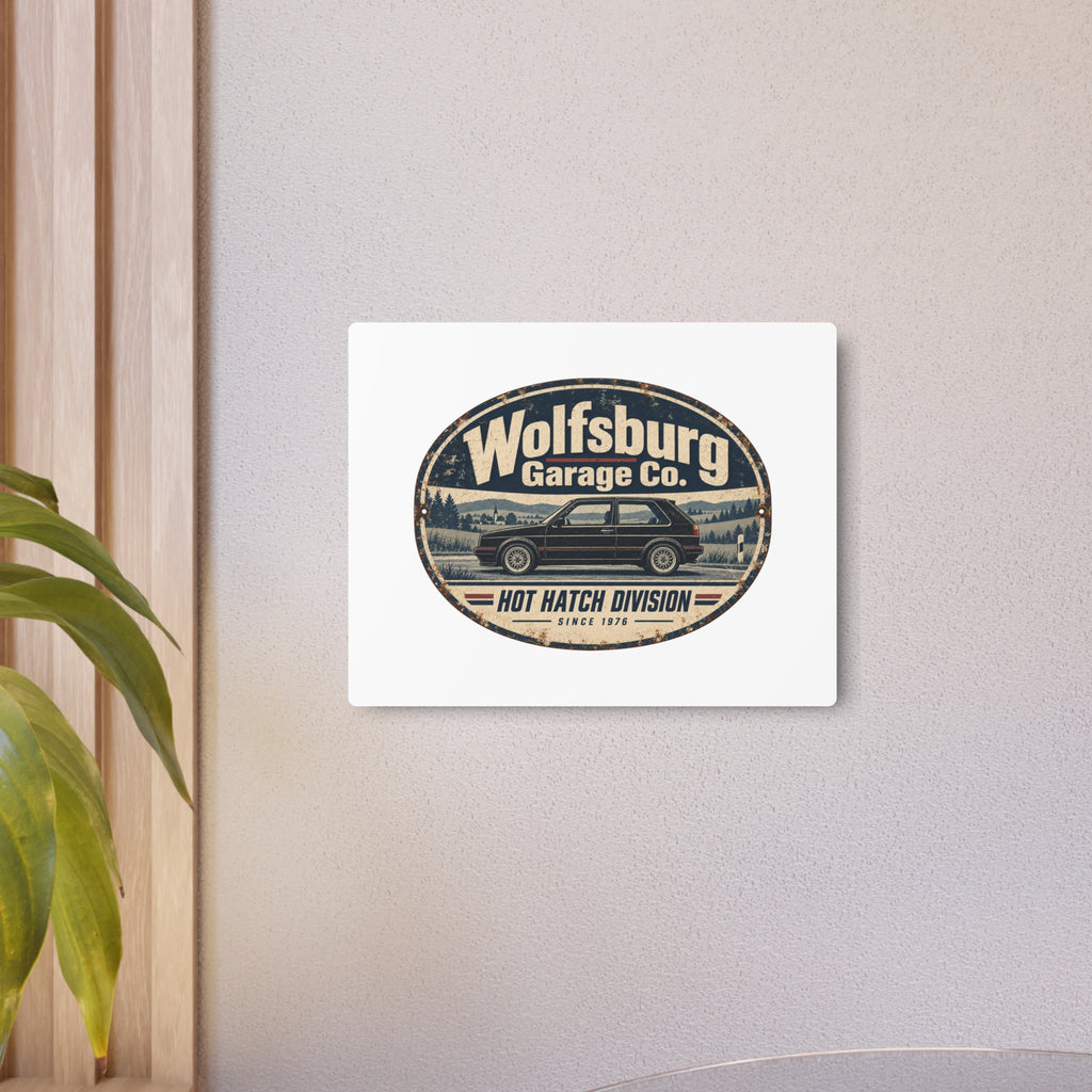 Wolfsburg Garage Co. metal sign displayed on a wall in a modern room