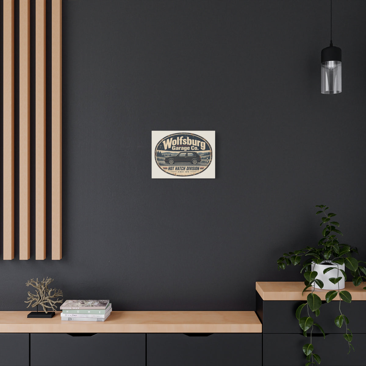 Wolfsburg Garage Co classic hot hatch canvas wall art displayed against a dark interior wall