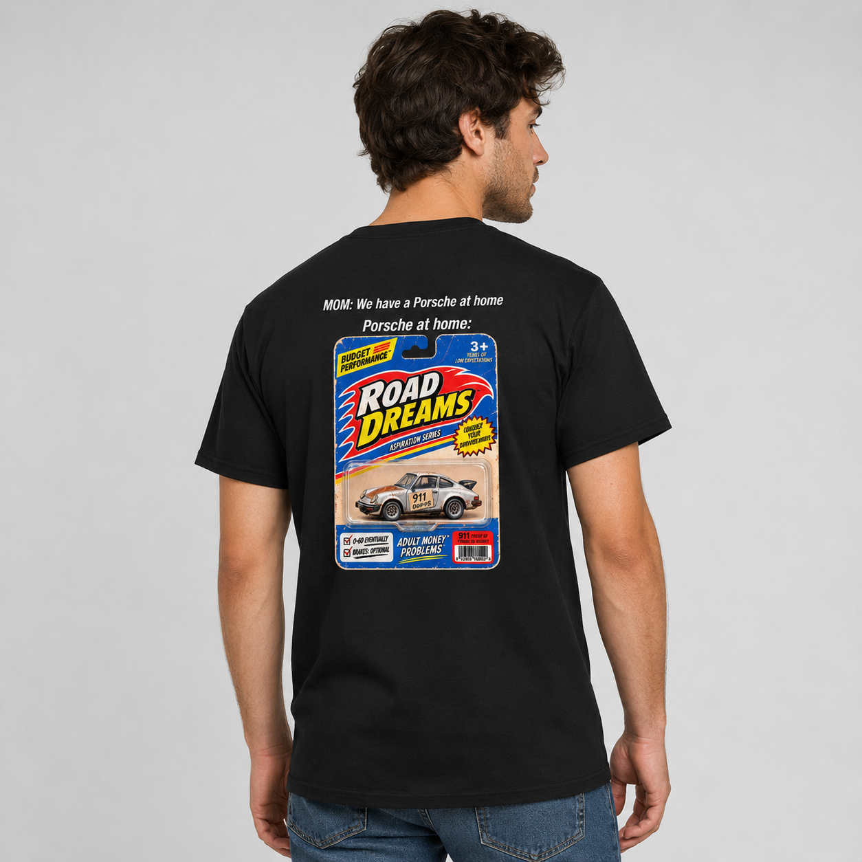 Model wearing black funny Porsche T-shirt showing the Road Dreams back print