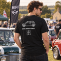 Man wearing black Mini Cooper manual transmission T-shirt at a classic British car meet