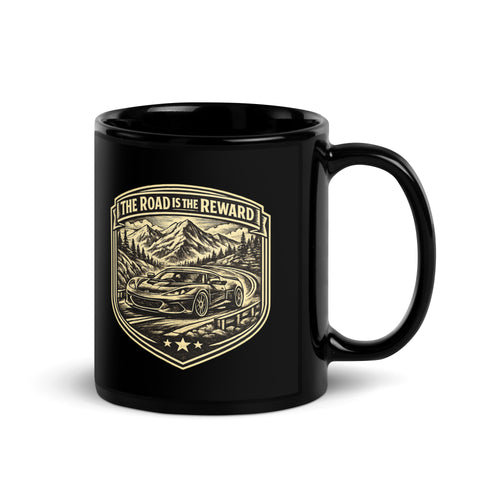 Black sports car coffee mug with “The Road Is the Reward” vintage automotive artwork, front view