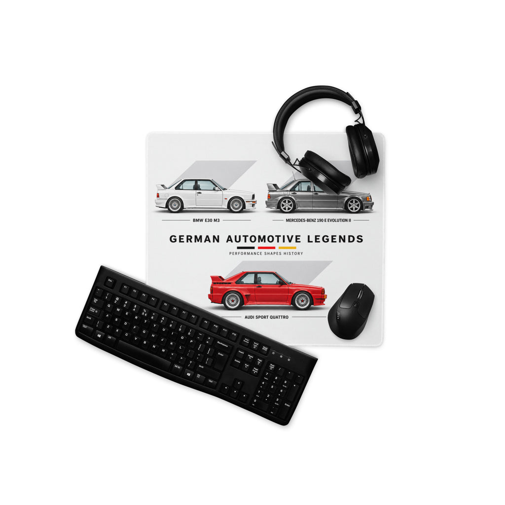 Automotive gaming mouse pad with BMW E30 M3, Mercedes 190E Evo II and Audi Sport Quattro beside keyboard and mouse