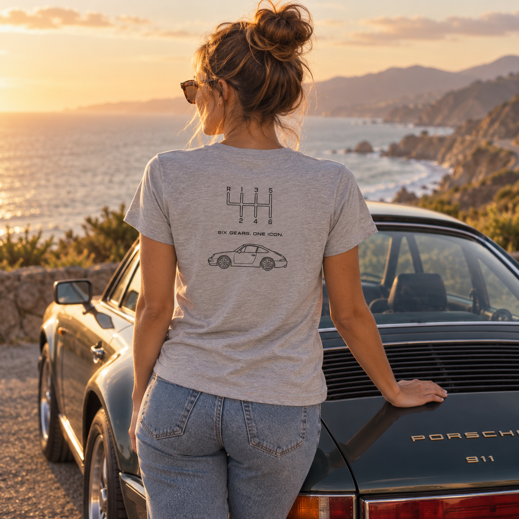 Woman wearing gray Classic 911 Six Gears One Icon T-shirt at the beach