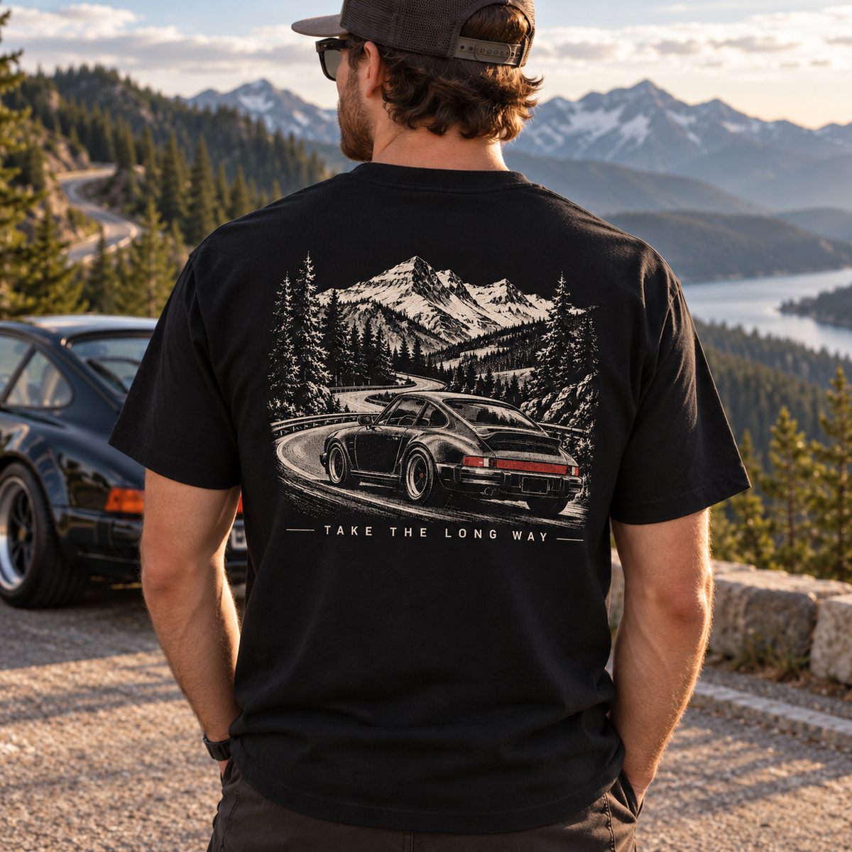 Black Take The Long Way T-shirt worn at scenic mountain-road overlook with large vintage back print
