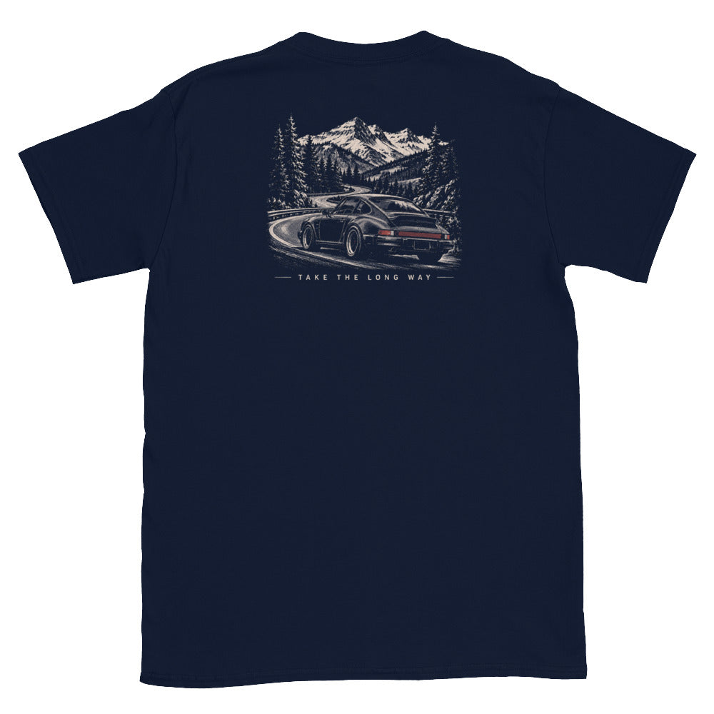 Navy Take The Long Way T-shirt back view with woodcut-style mountain road, evergreen trees, and sports car