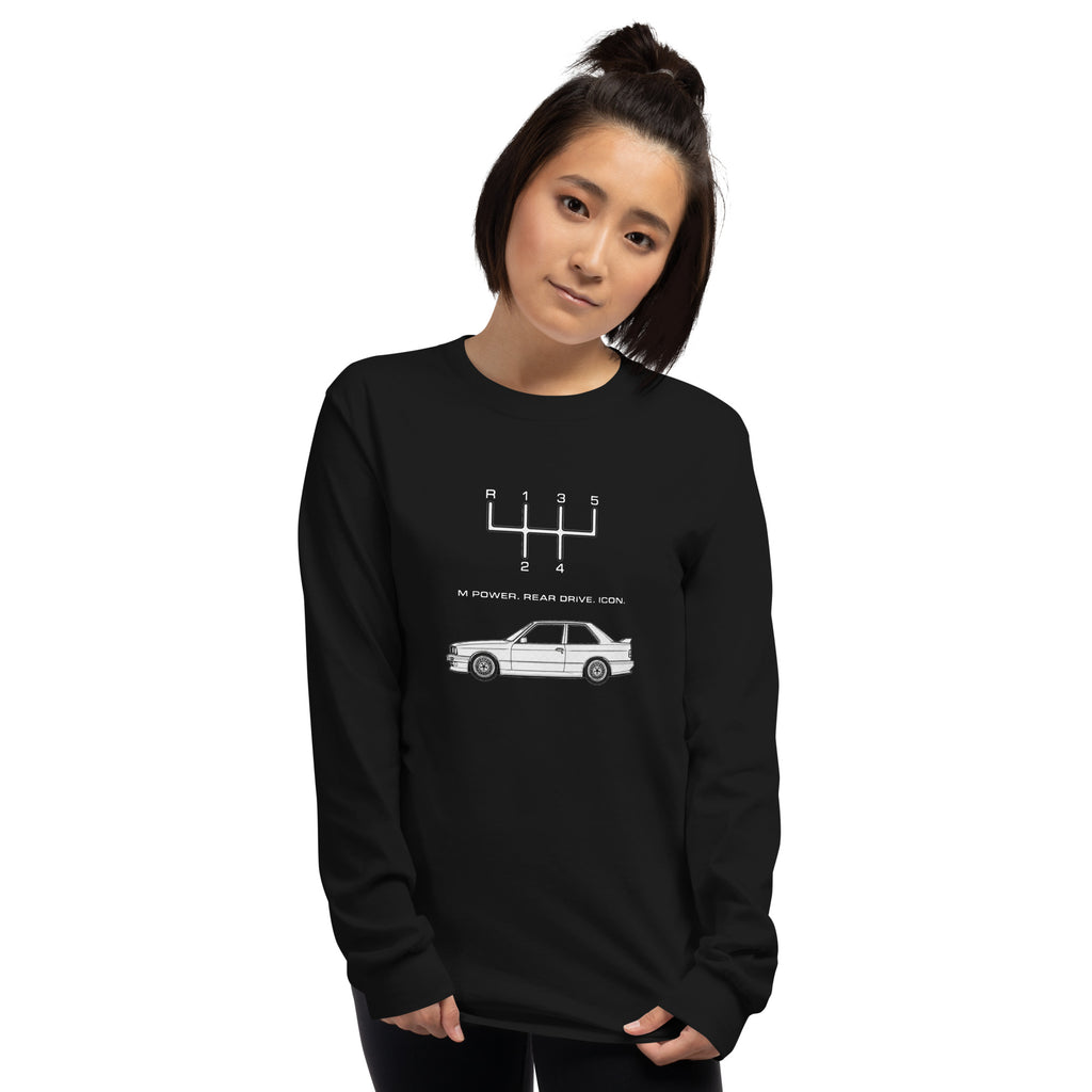Woman wearing black E30 M3 long sleeve enthusiast shirt with manual transmission and classic car graphic.