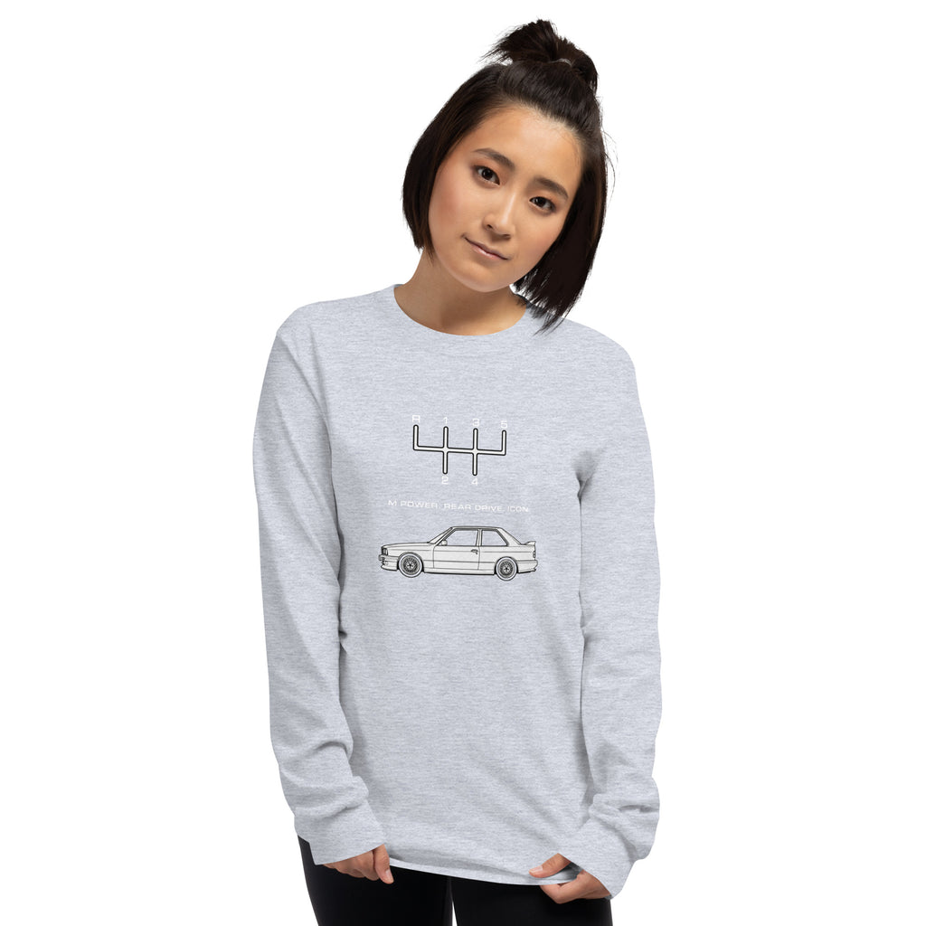Woman wearing Sport Grey E30 M3 long sleeve T-shirt with dark manual transmission and classic car artwork.