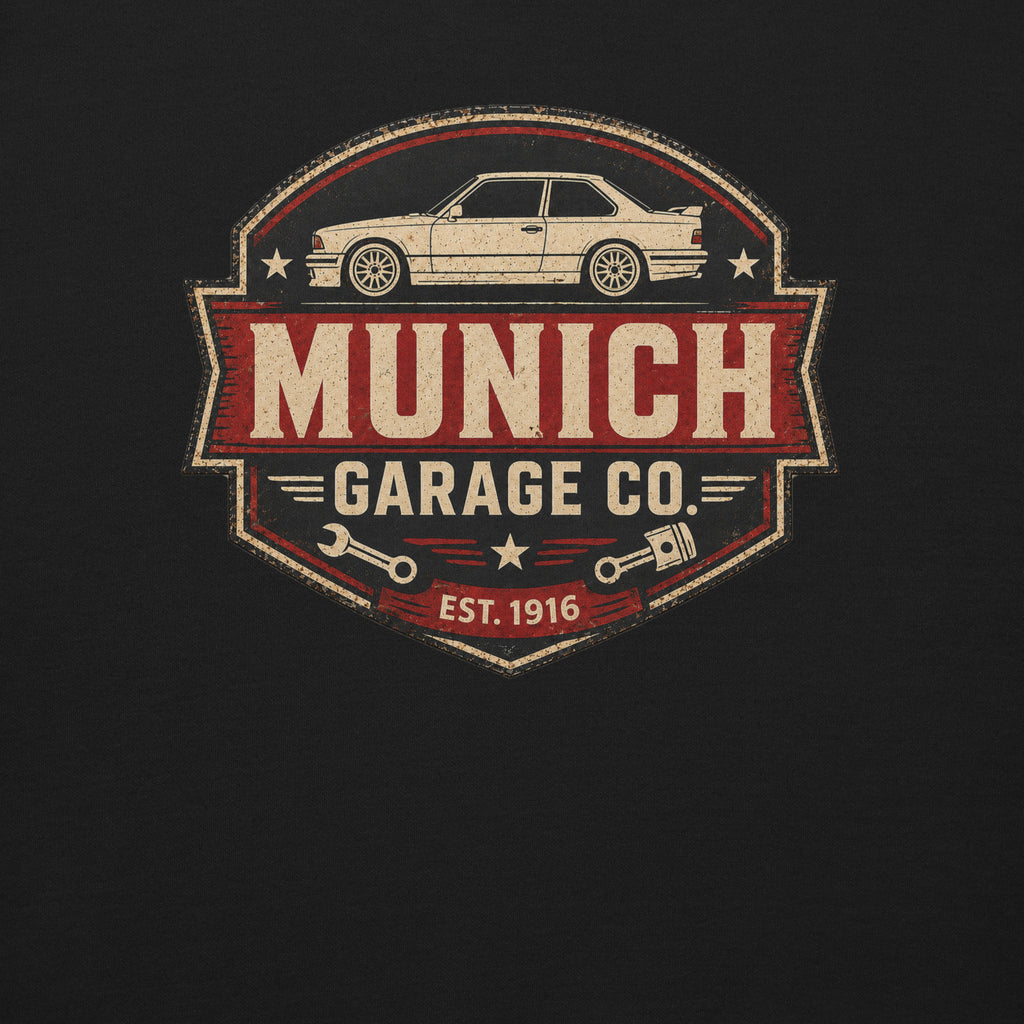 Close-up of distressed Munich Garage Co. graphic with classic German performance coupe illustration