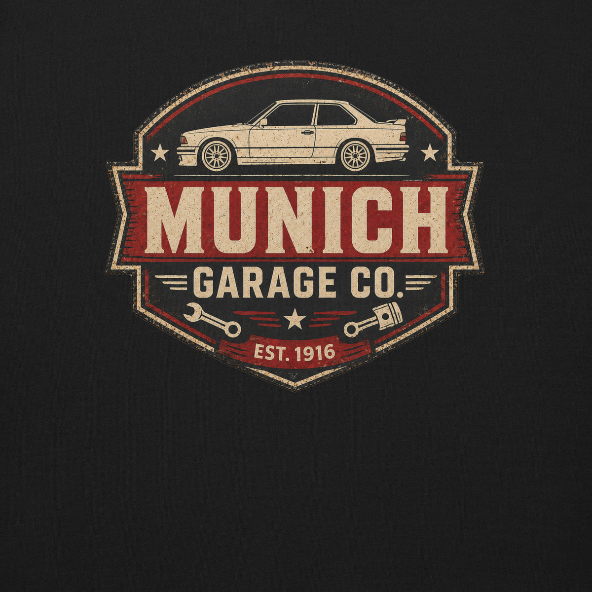 Close-up of distressed Munich Garage Co. graphic with classic German performance coupe illustration