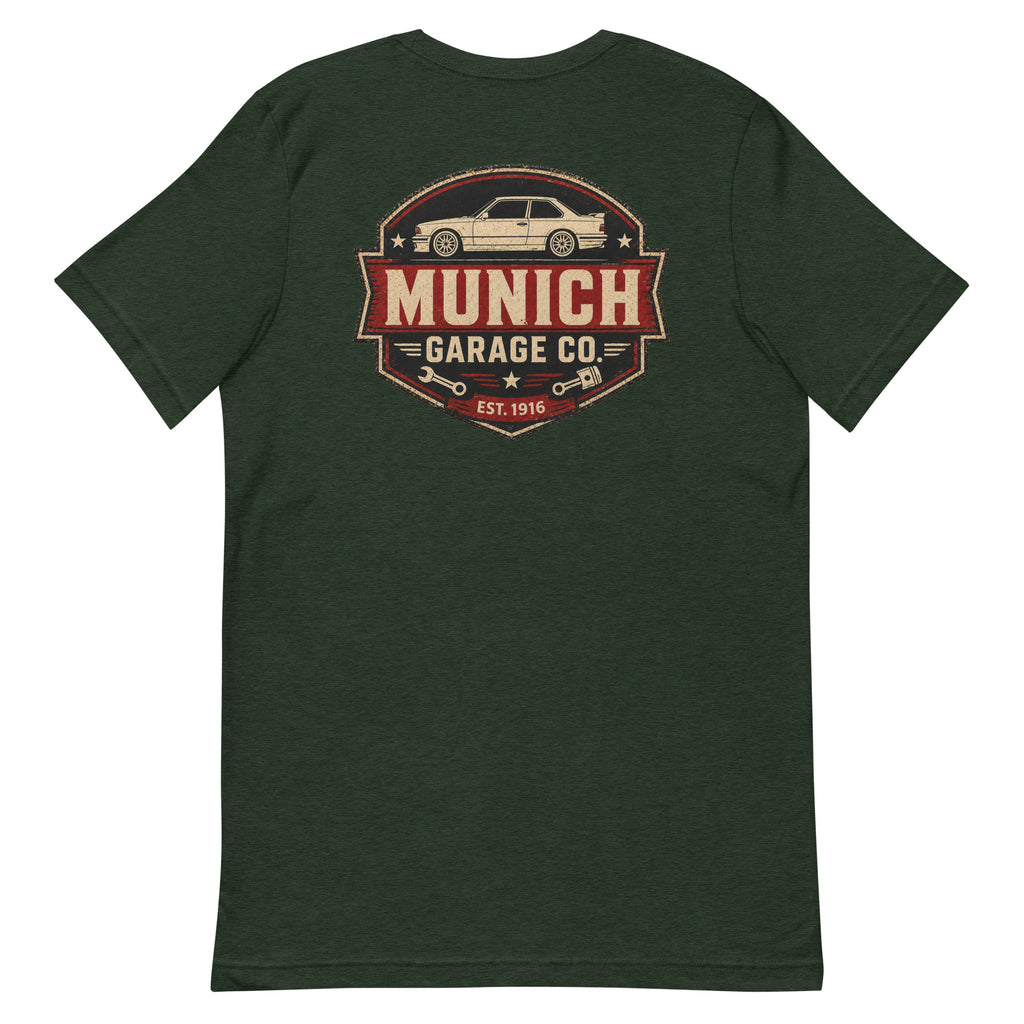Back-view flat lay of forest green Munich Garage Co. T-shirt with large vintage-inspired rear print.