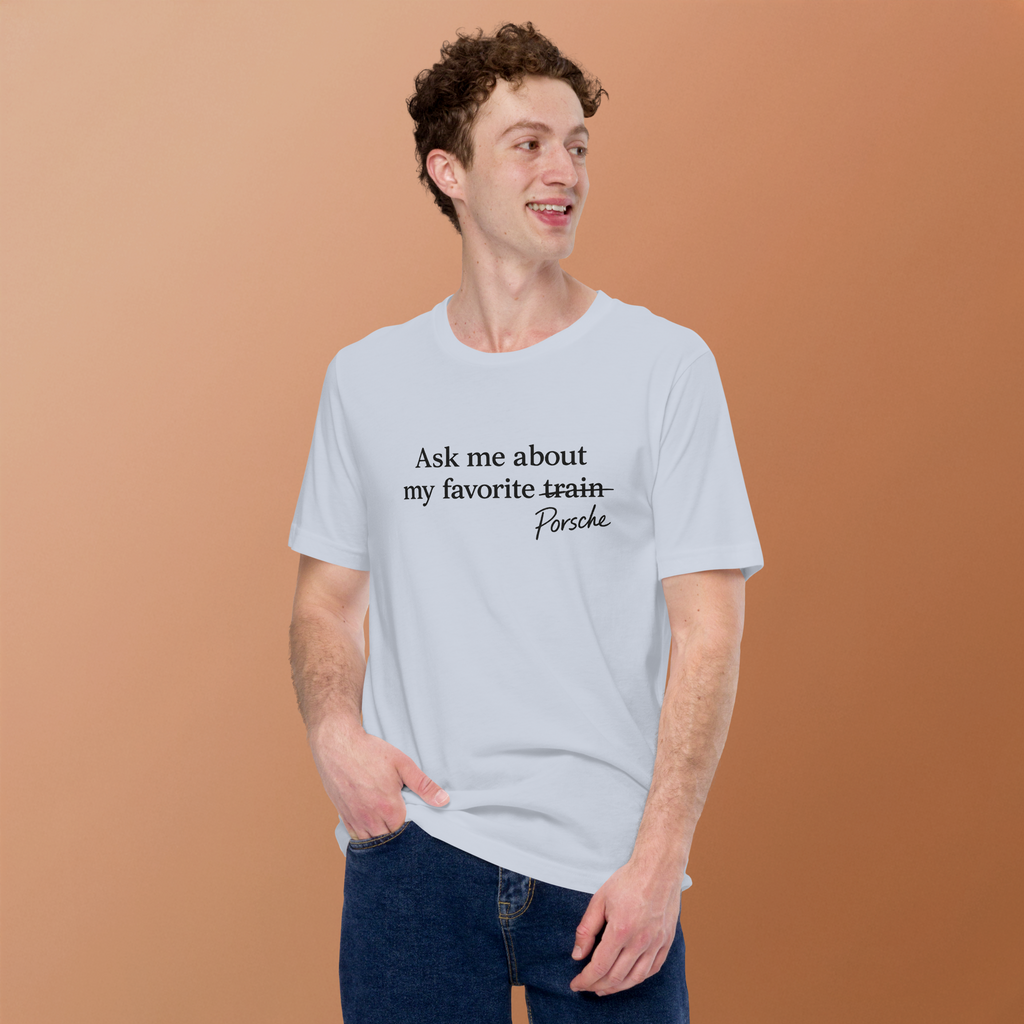 Male model wearing light-colored Porsches Not Trains T-shirt showing front graphic and fit