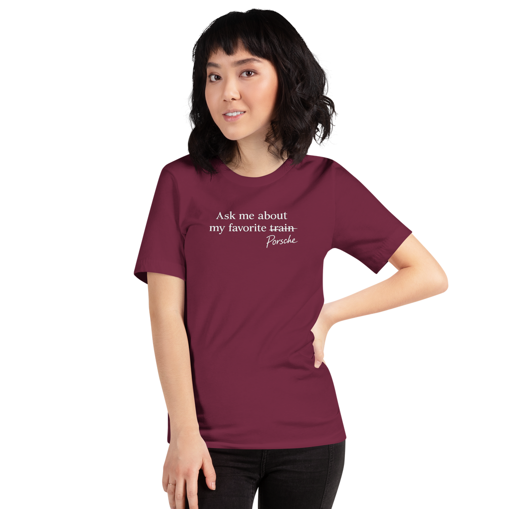 Woman wearing maroon Bella + Canvas 3001 Porsche humor T-shirt with front graphic