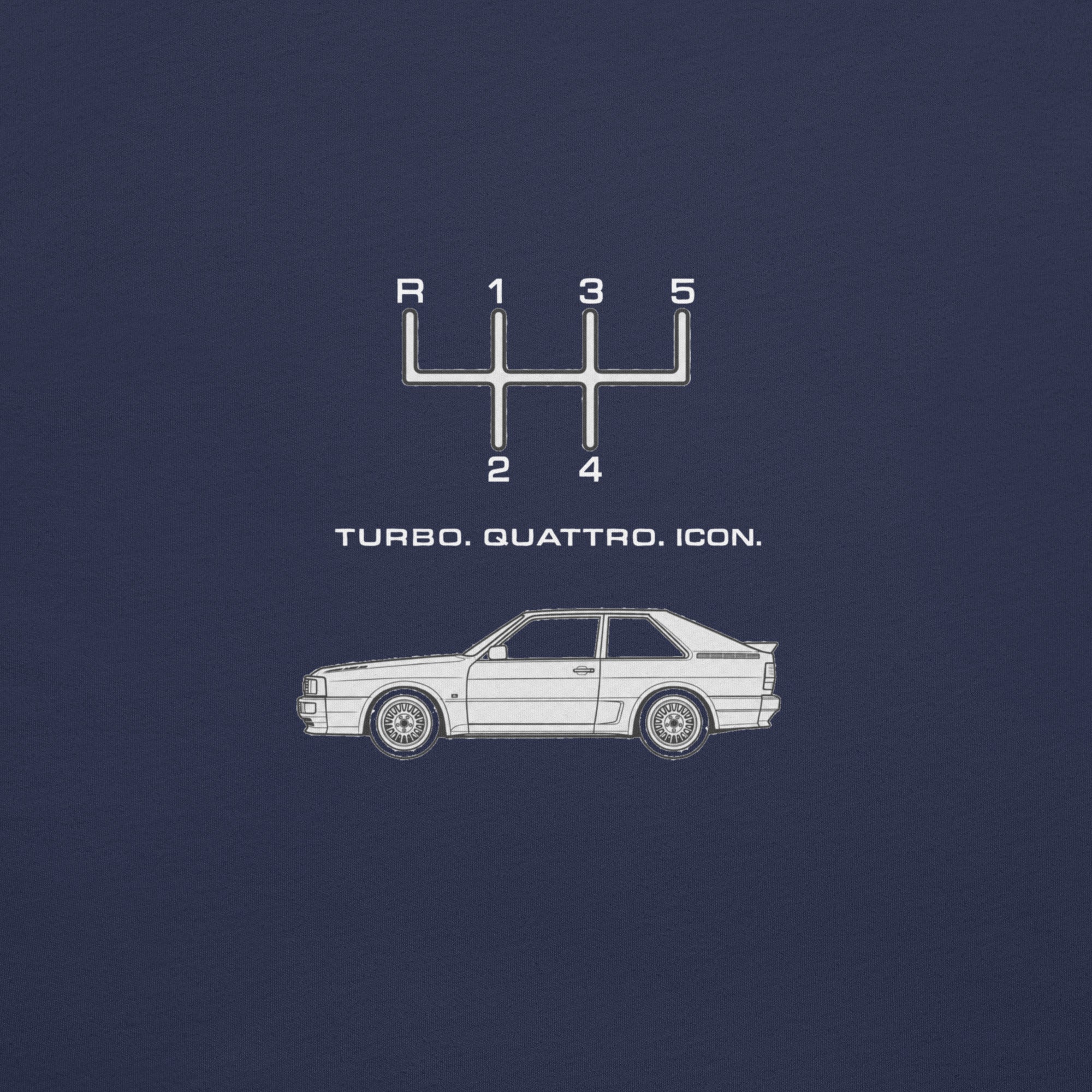 Close-up of Navy Audi Quattro T-shirt back graphic with 5-speed shift pattern, Quattro silhouette and Turbo Quattro Icon text