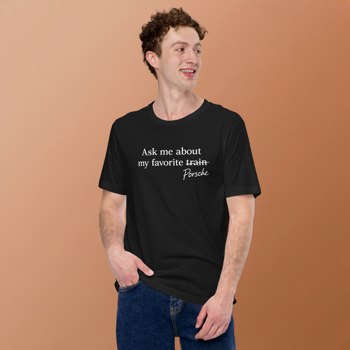 Model wearing black Porsches Not Trains Porsche humor T-shirt with white front graphic